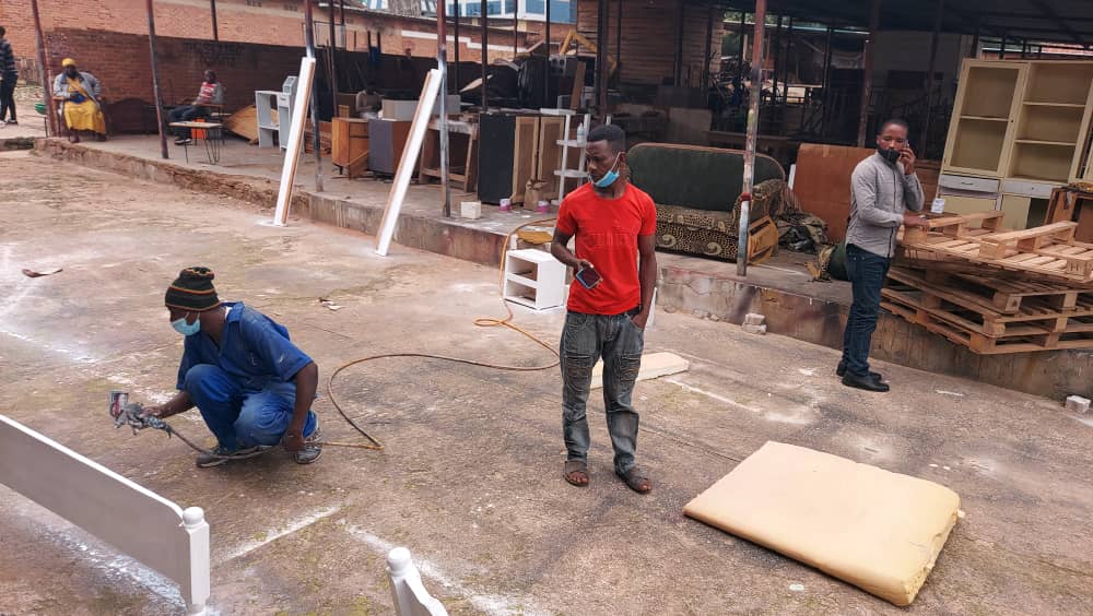 Mentorship in Action: Former Street Youth Leading Change Former street youth mentoring peers in carpentry workshop